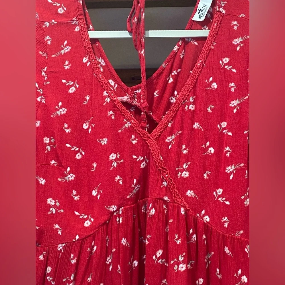 4/$25*Hollister, featuring a V-neck, peplum hem, and long flared sleeves. L - Picture 3 of 7